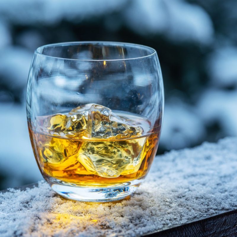 A dram of whisky on a frosty wall