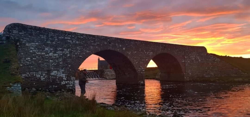 Sunset on the bridgepool of River Thurso