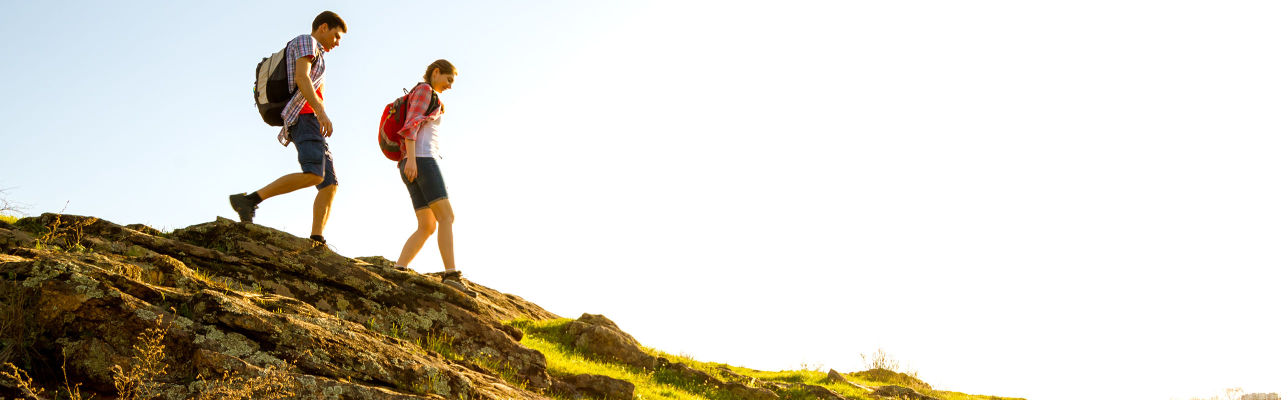 A couple hiking in the summer