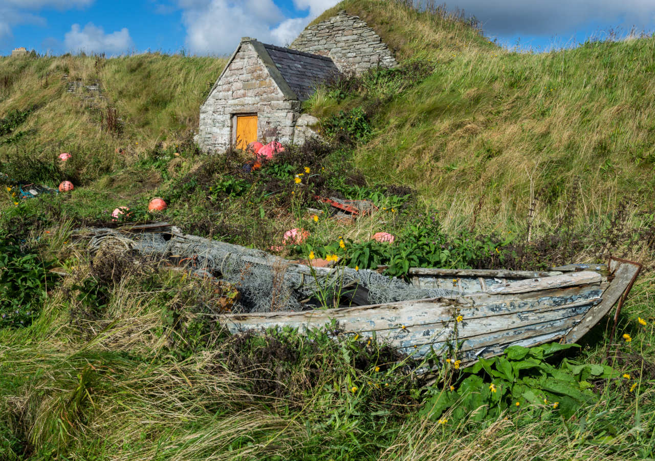 Old boat on the banks near Keiss Harbour